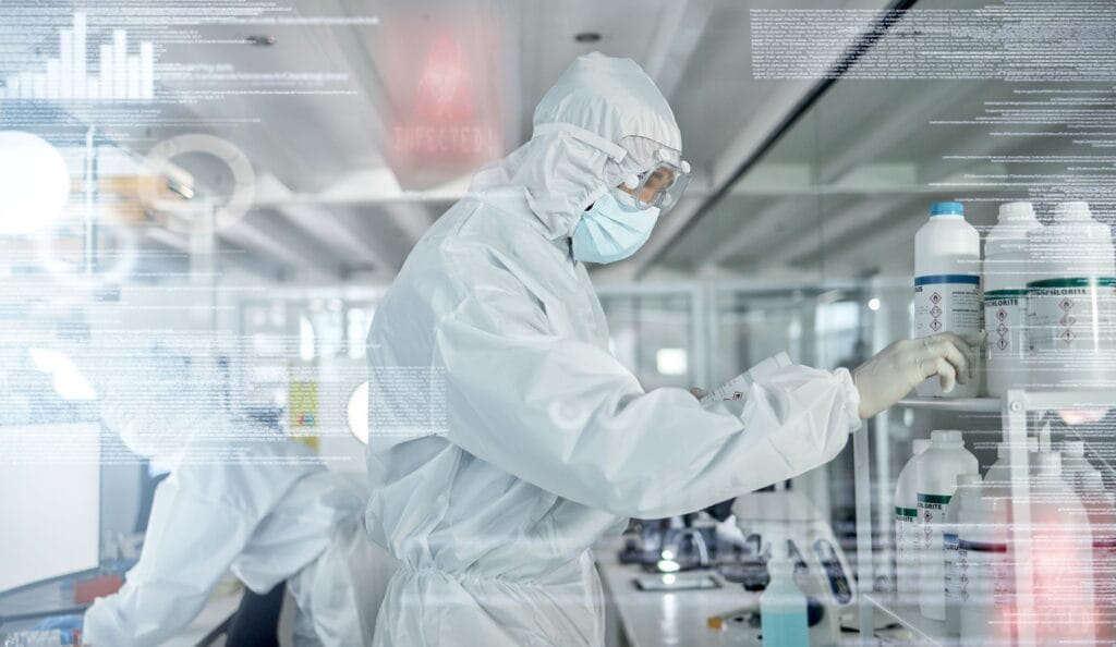 Researcher in a protective suit working in a laboratory